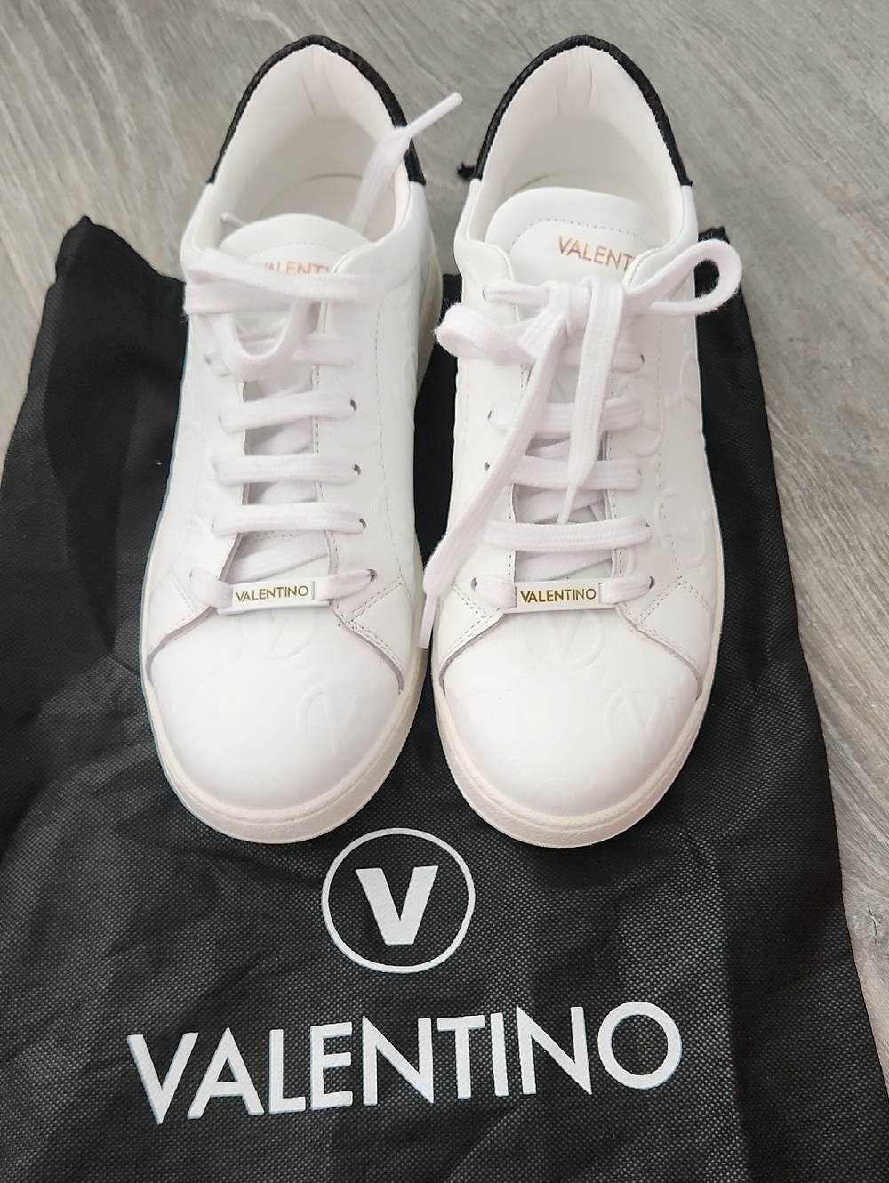 Valentino White Leather Sneakers with Black Heel Tab and Gold Logo